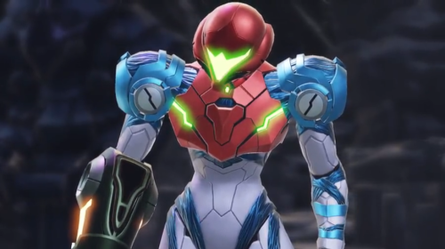 The character Samus Aran (from Nintendo's Metroid: Dread) inspecting the gun arm of her power suit.