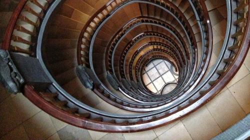 Photo of a seemingly endless spiral staircase. There are so, so many steps.