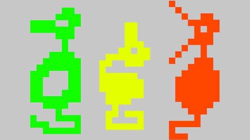 Three pixel dragon sprites from the game Adventure. They look more like ducks or seahorses, really.