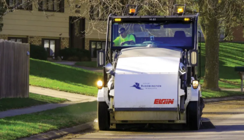 Photo of a street sweeper truck working on the roads of Bloomington, a city in Minnesota.