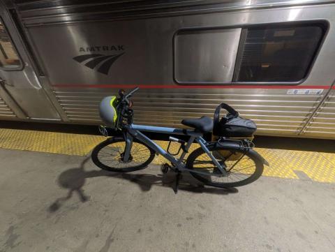 Amtrak train, electric bicycle, and helmet