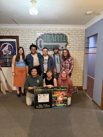 Picture of Lydia, Mark, Dale and friends beating a puzzle room.